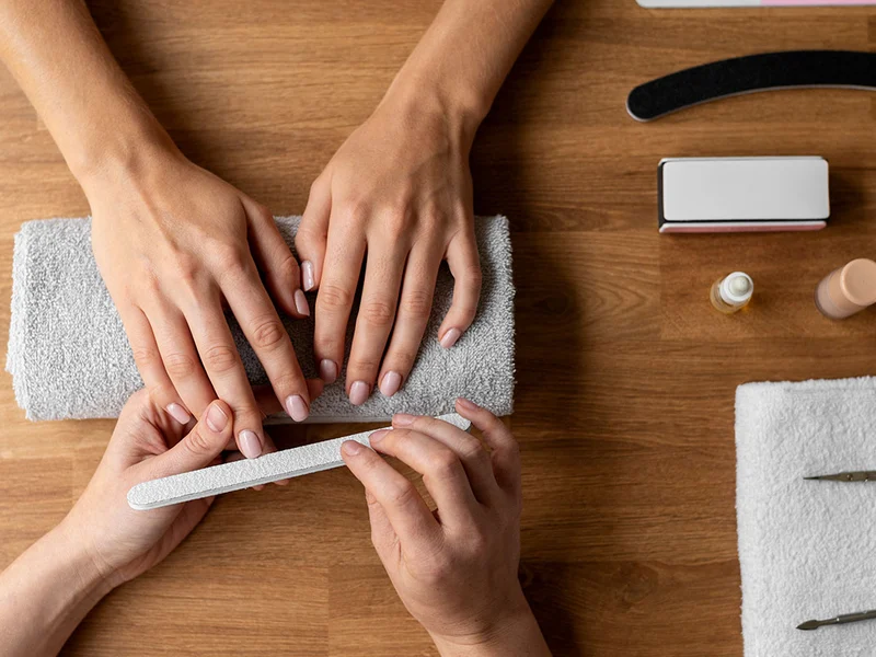 Professional manicure and gentle nail care service at an upscale nail salon